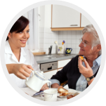 nurse serving food to patient