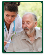 nurse taking temperature of patient